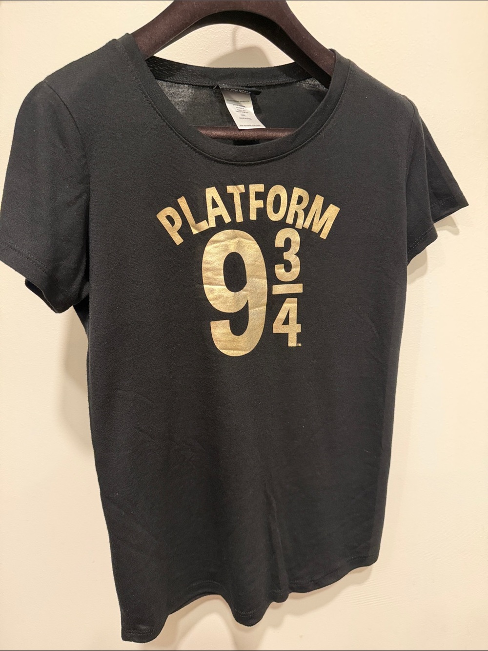 Black Short-Sleeve Tee with Metallic Gold Platform 9 3/4 Graphic